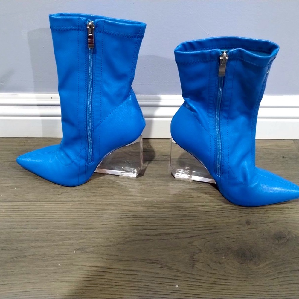 Denim blue pointed toe bootie with clear chunky heel
